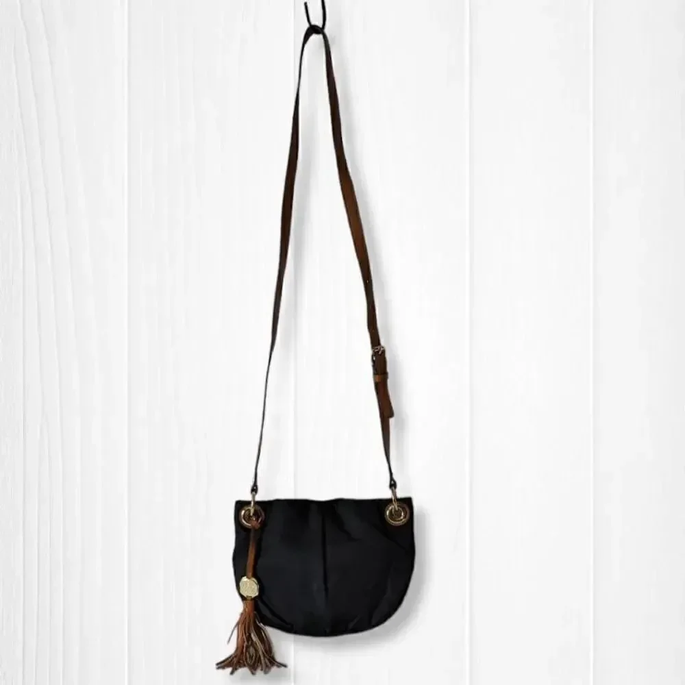 Vince Camuto Womens Sling Bag Adjustable Strap Tasseled Black and Brown